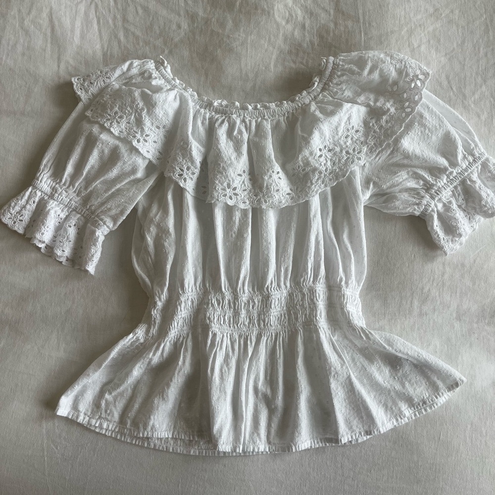 Cute eyelet peplum top